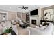 Cozy living room with a brick fireplace, plush seating, and tasteful decor at 5430 Hyde Rd, Cumming, GA 30040