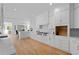 Modern kitchen with white cabinets, stainless steel appliances, and a spacious island, perfect for entertaining at 860 Crest Valley Dr, Sandy Springs, GA 30327