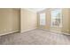Neutral bedroom with carpet and white trim at 125 Ancient Oak Ln, Stockbridge, GA 30281