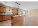 Beautiful kitchen featuring granite counters, a center island, and stainless appliances at 125 Ancient Oak Ln, Stockbridge, GA 30281