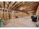 Unfinished basement featuring concrete floor and exposed wood framing at 131 Forsyth Park Ln, Woodstock, GA 30188