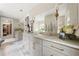Primary bathroom boasts double vanity, granite countertops, and natural lighting at 131 Forsyth Park Ln, Woodstock, GA 30188