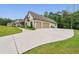 Spacious garage with ample parking and lush green lawn at 131 Forsyth Park Ln, Woodstock, GA 30188