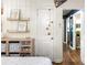 Neutral bedroom showcasing a white door with access to other rooms in the house at 1744 Blossom Ln, Austell, GA 30168