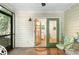 View from screened porch into a kitchen area with light colored walls at 1744 Blossom Ln, Austell, GA 30168