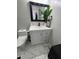 Modern bathroom with a stylish vanity, mirror, and marble tile floor at 2535 Village Creek Lndg, Atlanta, GA 30316