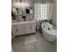 Bright bathroom featuring double vanity, soaking tub, and stylish decor with a modern design at 2535 Village Creek Lndg, Atlanta, GA 30316