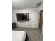 Modern bedroom featuring a wall-mounted TV and stylish decor at 2535 Village Creek Lndg, Atlanta, GA 30316