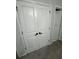 White double doors accessing a closet on grey carpet at 2535 Village Creek Lndg, Atlanta, GA 30316
