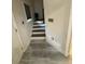 Inviting foyer featuring stairs and a window, creating a seamless transition into the home at 2535 Village Creek Lndg, Atlanta, GA 30316