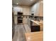 Bright kitchen with stainless steel appliances, white cabinets, and stylish backsplash, creating a functional space at 2535 Village Creek Lndg, Atlanta, GA 30316