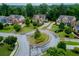 Aerial view of a residential street with mature landscaping, well-maintained homes, and cul-de-sac at 2579 Lulworth Ln, Marietta, GA 30062