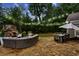 Backyard boasts a stone patio, fireplace and comfortable lounge area at 2579 Lulworth Ln, Marietta, GA 30062