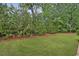 Well-maintained backyard lawn, ready for outdoor enjoyment at 2579 Lulworth Ln, Marietta, GA 30062