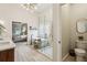 A wide angle shot of the bathroom which shows the shower, bath, vanity and commode at 2579 Lulworth Ln, Marietta, GA 30062