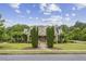 Charming home with lush landscaping and a welcoming front porch on a tree-lined street at 2579 Lulworth Ln, Marietta, GA 30062