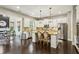 Modern kitchen with white cabinets, stainless steel appliances, granite countertops, and a breakfast bar at 2579 Lulworth Ln, Marietta, GA 30062