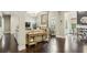 Spacious living room with hardwood floors, a fireplace, and an adjacent dining area at 2579 Lulworth Ln, Marietta, GA 30062