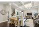 Elegant living room showcasing a coffered ceiling, modern chandelier, and sophisticated furnishings at 2579 Lulworth Ln, Marietta, GA 30062