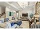 Bright and airy living room with coffered ceilings, fireplace, and comfortable seating at 2579 Lulworth Ln, Marietta, GA 30062