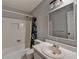 Clean bathroom with a tub/shower and a single vanity at 2816 Highland Park Dr, Stone Mountain, GA 30087