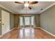 Bedroom with hardwood floors and bay window at 2816 Highland Park Dr, Stone Mountain, GA 30087