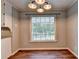 Charming dining area with a large window view of nature at 2816 Highland Park Dr, Stone Mountain, GA 30087