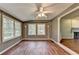 The living room has hardwood floors, recessed lights and a ceiling fan at 2816 Highland Park Dr, Stone Mountain, GA 30087