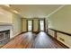 Cozy living room with fireplace and hardwood floors at 2816 Highland Park Dr, Stone Mountain, GA 30087