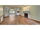 Spacious living room featuring a fireplace and built-in shelves at 2816 Highland Park Dr, Stone Mountain, GA 30087