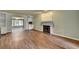 Open living room with fireplace and built-in shelving at 2816 Highland Park Dr, Stone Mountain, GA 30087