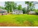Sprawling backyard with a well-manicured lawn and ample space for recreation and relaxation at 2735 Jims Ne Rd, Marietta, GA 30066