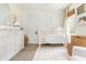 Beautiful Bedroom featuring a white crib, dresser, and decor at 2735 Jims Ne Rd, Marietta, GA 30066