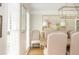 Elegant dining room with a modern chandelier, stylish decor, and plenty of natural light at 2735 Jims Ne Rd, Marietta, GA 30066