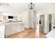 Bright, open kitchen features a large island, stainless steel appliances, and seamless flow into the living area at 2735 Jims Ne Rd, Marietta, GA 30066