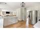 Bright kitchen with stainless steel fridge and a view into the living room at 2735 Jims Ne Rd, Marietta, GA 30066