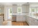 Well-lit kitchen features white countertops, stainless steel appliances, and sleek cabinets at 2735 Jims Ne Rd, Marietta, GA 30066