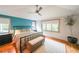 Serene bedroom with hardwood floors, ample natural light, and stylish decor at 1267 Thomas Rd, Decatur, GA 30030