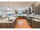 Stylish kitchen boasts a spacious island, stainless steel appliances, and ample cabinet space at 1267 Thomas Rd, Decatur, GA 30030