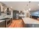Modern kitchen featuring stainless steel appliances, ample counter space, and a center island at 1267 Thomas Rd, Decatur, GA 30030