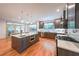 Open-concept kitchen featuring a large island, modern appliances, and ample counter space perfect for entertaining guests at 1267 Thomas Rd, Decatur, GA 30030