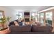 Comfortable living room with a fireplace, cozy sofas, and access to an outdoor patio at 1267 Thomas Rd, Decatur, GA 30030