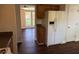 Kitchen area with plentiful cabinets, modern appliances, and hardwood floors at 311 Indus Ln, Lawrenceville, GA 30044