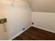 Spacious utility room with laminate wood flooring and white trim at 311 Indus Ln, Lawrenceville, GA 30044