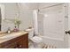 Bathroom featuring a single vanity, shower-tub combo, and neutral decor at 3328 Chastain Gardens Nw Dr, Kennesaw, GA 30144