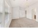 Airy bedroom with natural light and a view of the en suite bathroom at 3328 Chastain Gardens Nw Dr, Kennesaw, GA 30144