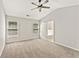 Spacious bedroom featuring a ceiling fan, neutral walls, and plush carpeting at 3328 Chastain Gardens Nw Dr, Kennesaw, GA 30144
