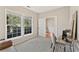 Bedroom featuring neutral walls, natural light, and office setup for a comfortable work space at 3328 Chastain Gardens Nw Dr, Kennesaw, GA 30144