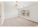 Spacious bedroom with neutral carpet, large windows, and ample natural light at 3328 Chastain Gardens Nw Dr, Kennesaw, GA 30144