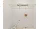 Simple laundry room area includes shelving at 3328 Chastain Gardens Nw Dr, Kennesaw, GA 30144
